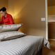 A woman cleans an Airbnb rental in Las Vegas in February 2017. Photo: AP